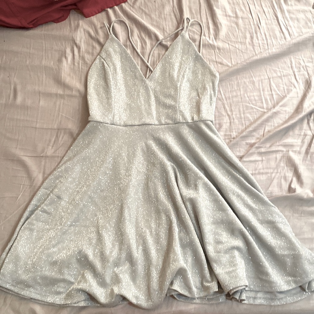 Sparkly Silver Dress, short, crosses in the back, in good condition, worn once